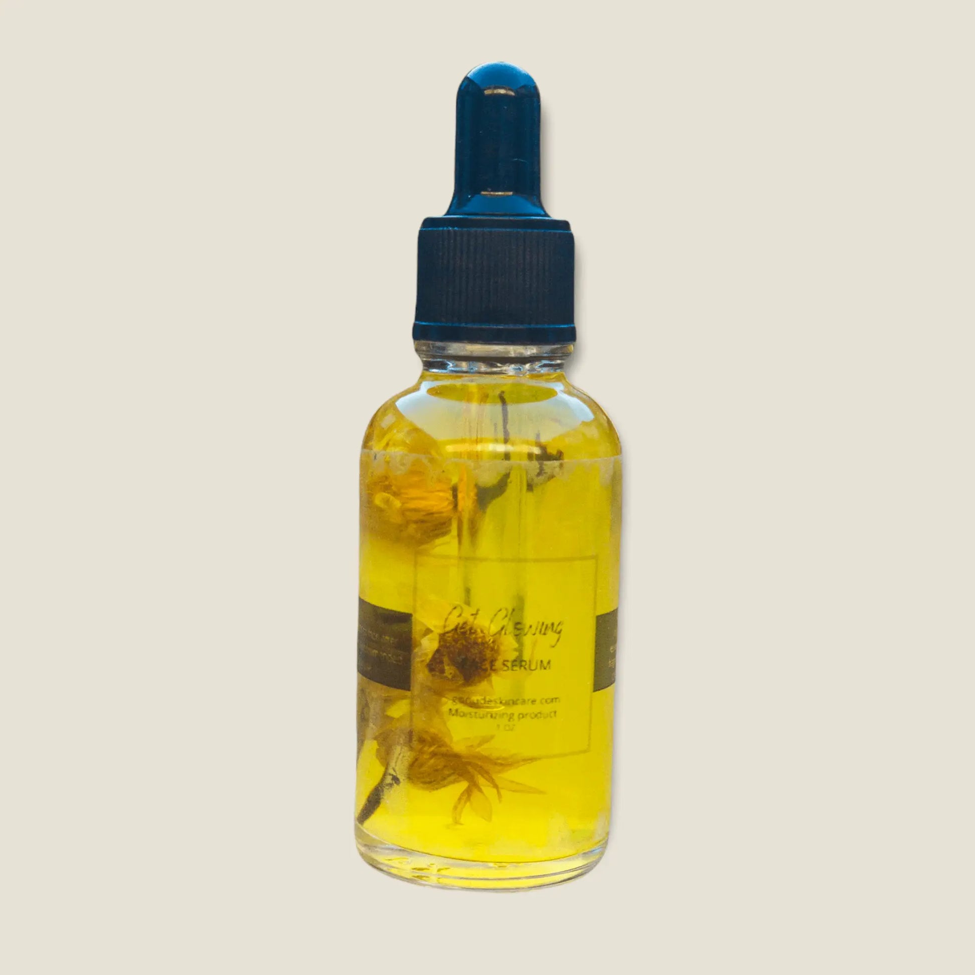 Picture of 1 ounce dropper bottle of glowing facial moisturizer serum on a gray background.